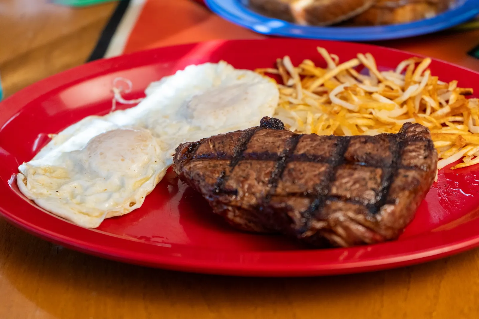 Steak and eggs with shoestring hash browns